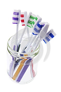 Toothbrushes in Glass Jar