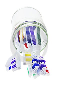 Toothbrushes in Glass Jar