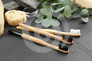 Toothbrushes made of bamboo on stone table