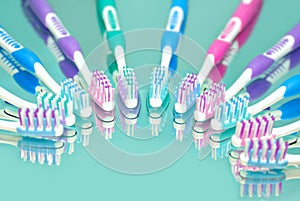 Toothbrushes in water drops