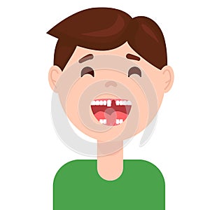 Toothless boy smiling and showing milk tooth and permanent teeth in eruption photo