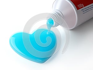 Toothpaste in the shape of heart coming out from toothpaste tube. Brushing teeth dental concept