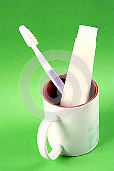 Toothpaste, toothbrush cup