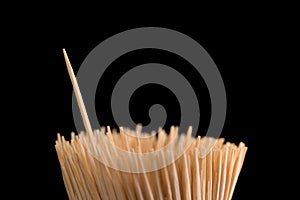 Toothpicks on a black background