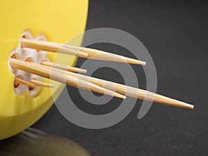 Toothpicks close up. Macro . Sharpened wooden sticks.