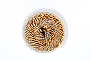 Toothpicks in a round box isolated on white background on with clipping path.