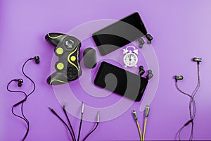 A toothy Smart Fish from gadgets devours time on a purple background photo