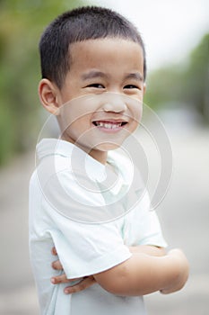 Toothy smiling face of asian children happiness emotion face