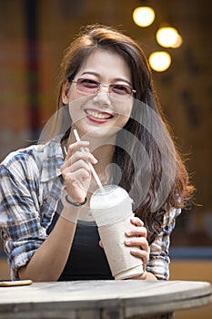 Toothy smiling face happiness emotion of younger asian woman wit
