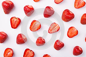 Top above overhead view photo of cut strawberries rows alternate with whole ones isolated on white background