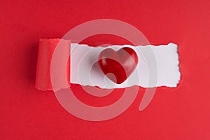 Top above overhead view photo of a red heart on torn red paper over white background with copyspace