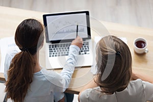 Top above view businesswomen working with computer program