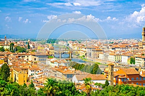 Top aerial panoramic view of Florence city with Ponte Vecchio bridge over Arno river