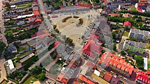 Top aerial panoramic view of Lowicz old town historical city centre with Rynek Market Square, Old Town Hall, New City Hall,