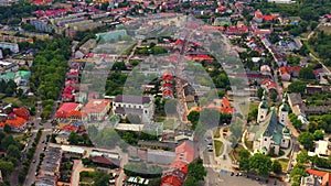 Top aerial panoramic view of Lowicz old town historical city centre with Rynek Market Square, Old Town Hall, New City Hall,