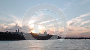 Top Aerial view moving fishing boat ocean. evening sailing motor boat with angler on Dnipro river at sunrise sunset