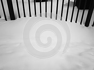 Top aligned fence on winter snow background