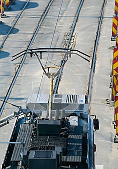 Top angle view of a tram motor mecanism and connection to electricity. Public transportation.