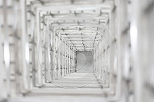 Top angle view of the white reinforced steel bar framework column construction in the work site