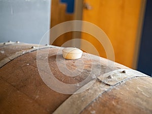 Top of barrel aged wine barrel stopper cork plug in winery