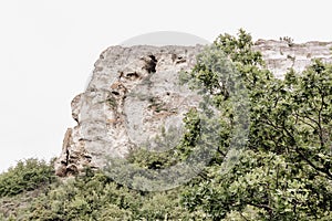 The top of the cliff in front of the abyss. A part of the mountain rock near the Dniester river, Ukraine