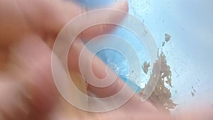 Top close-up view of a chef`s hands making meatballs