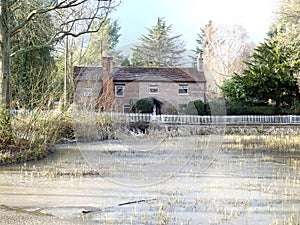 Top Common Pond and cottages in winter, Chorleywood Common