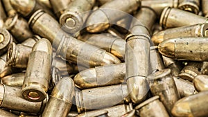 Top detail macro view of large group of gun bullets