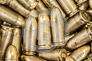 Top detail macro view of large group of gun bullets