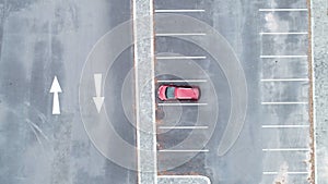 Top down Aerial view Drone shot of red suv car in the parking lot Outdoor