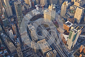 Top down aerial view of New York City  Brooklyn bridge infrastructure between the highrise modern office buildings