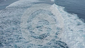 Top down aerial view of the ocean giant waves, foaming and splashing Slow-motion