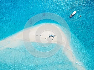 Top down aerial view of seascape atoll sandbank in Maldives