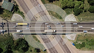 Top down aerial view of transportation highway overpass, ringway, roundabout