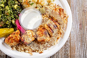 top down chicken kabob plate