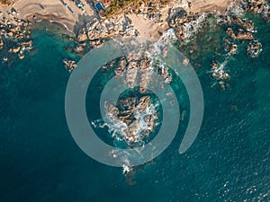 Top down of Conchas Chinas Beach in Puerto Vallarta Mexico showing rock formations in ocean