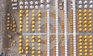 Top down drone aerial view of the umbrellas and gazebos on Italian sandy beaches. Riccione, Italy. Adriatic coast photo