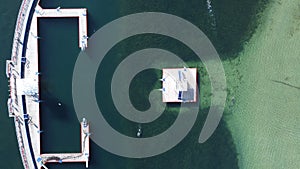 top down over diving boards and swimming platforms at a bayside protected swimming lap area, Geelong seaside waterfront,