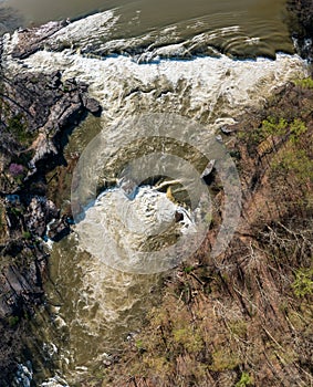 Top down over flooded Valley Falls on a bright spring morning