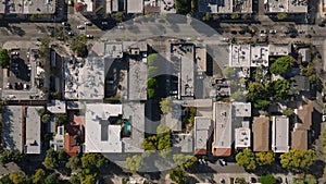 Top down panning shot of town development in metropolis. Houses and residencies in urban borough. Los Angeles