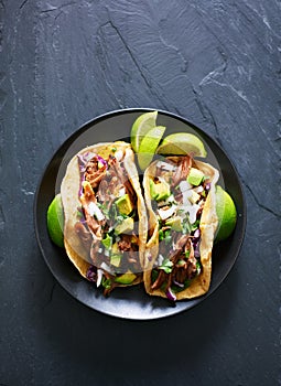 Top down phot of two mexican carnitas tacos on place in flat lay composition