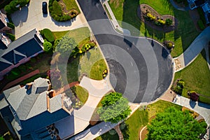 Top down view of beautiful houses in an upscale subdivision in suburbs of USA