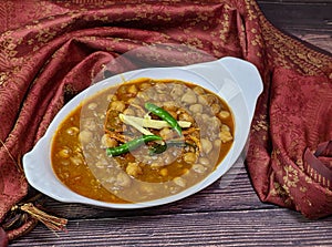 Top down view of a bowl of spicy and tangy Amritsari Chole