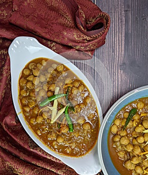 Top down view of a bowl of spicy and tangy Amritsari Chole