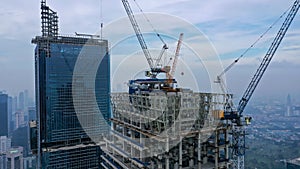 Top down view on different sky scrapers in a big city, fly over