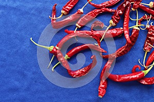 Top down view of dried red hot chilli peppers