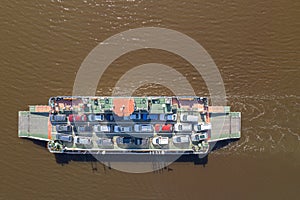 top down view of ferryboat sailing. Ferryboat transferring cars. Ferry transfers cars and passengers to the other side
