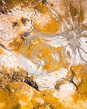 Top down view orange heart shape form on mud face form volcanoes site in chachuna nature reserve, VAshlovani national park,