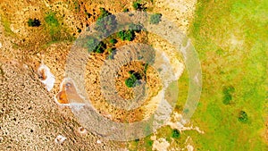 Top down view orange heart shape form on mud volcanoes site in chachuna nature reserve, VAshlovani national park