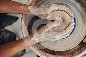 Top Down View of Potter Master at Work in Clay Studio, Handmade Process of Creating Pot on a Pottery Wheel